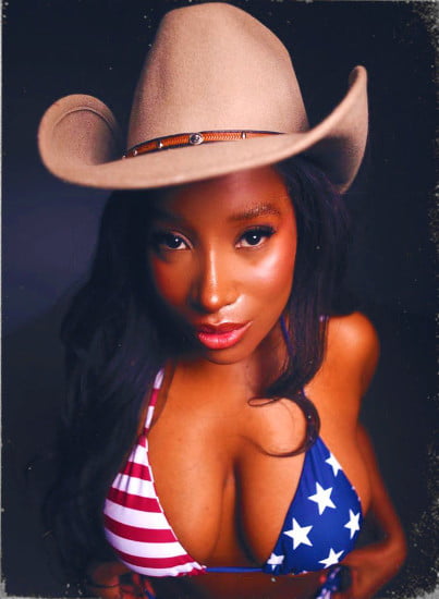 Petite black girl in a cowboy's hat and an American flag bikini